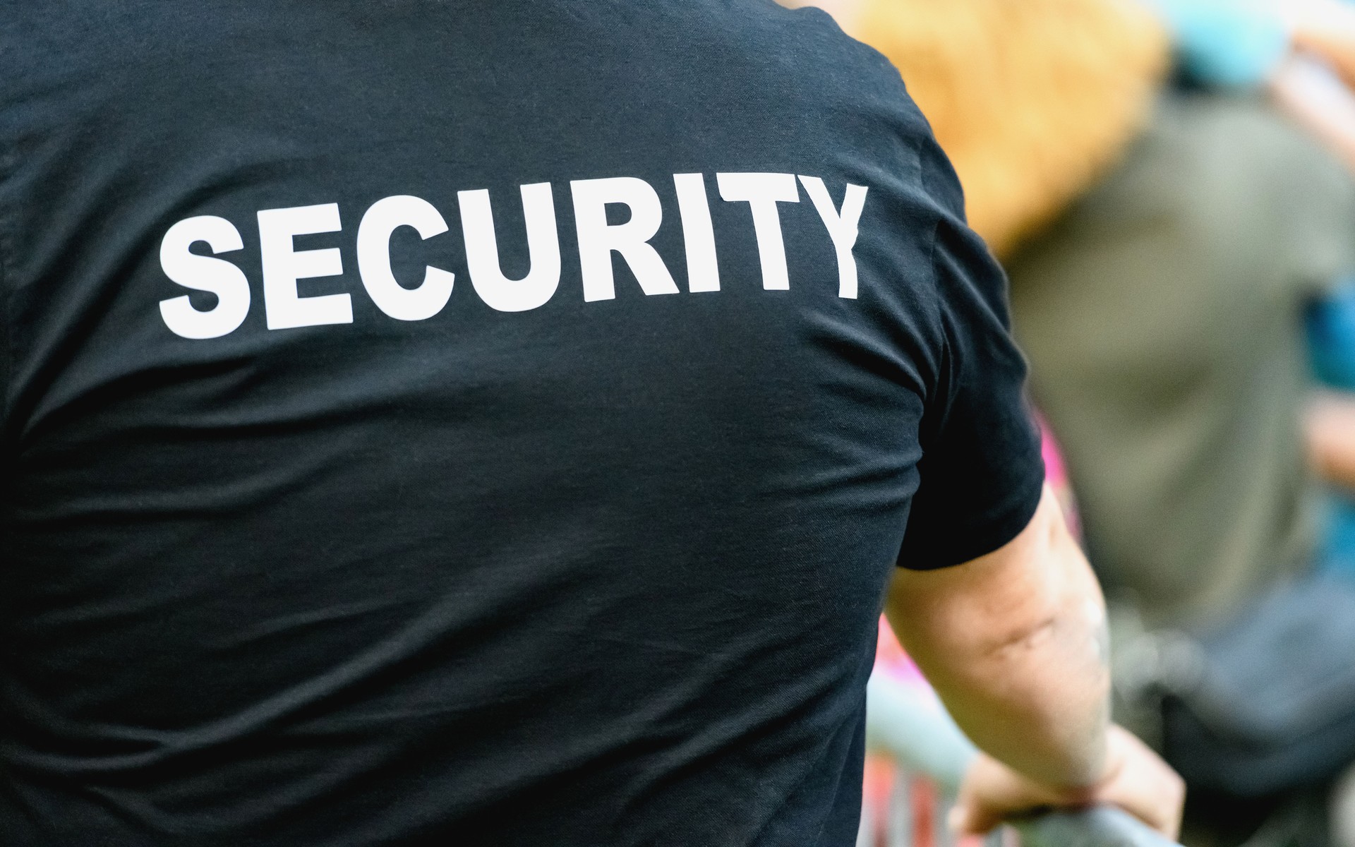 Rear view of security staff